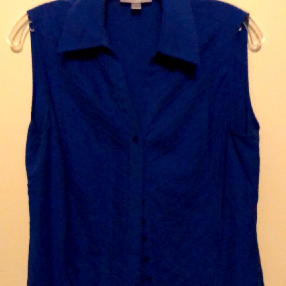 Woman’s navy button blouse